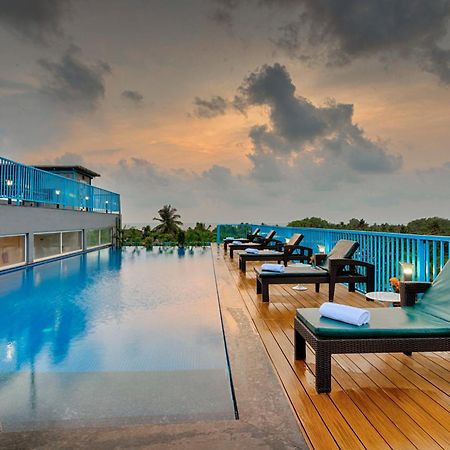 Hotel De Mandarin Candolim Exterior foto